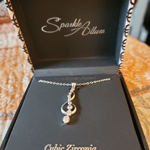 Treble cleft necklace